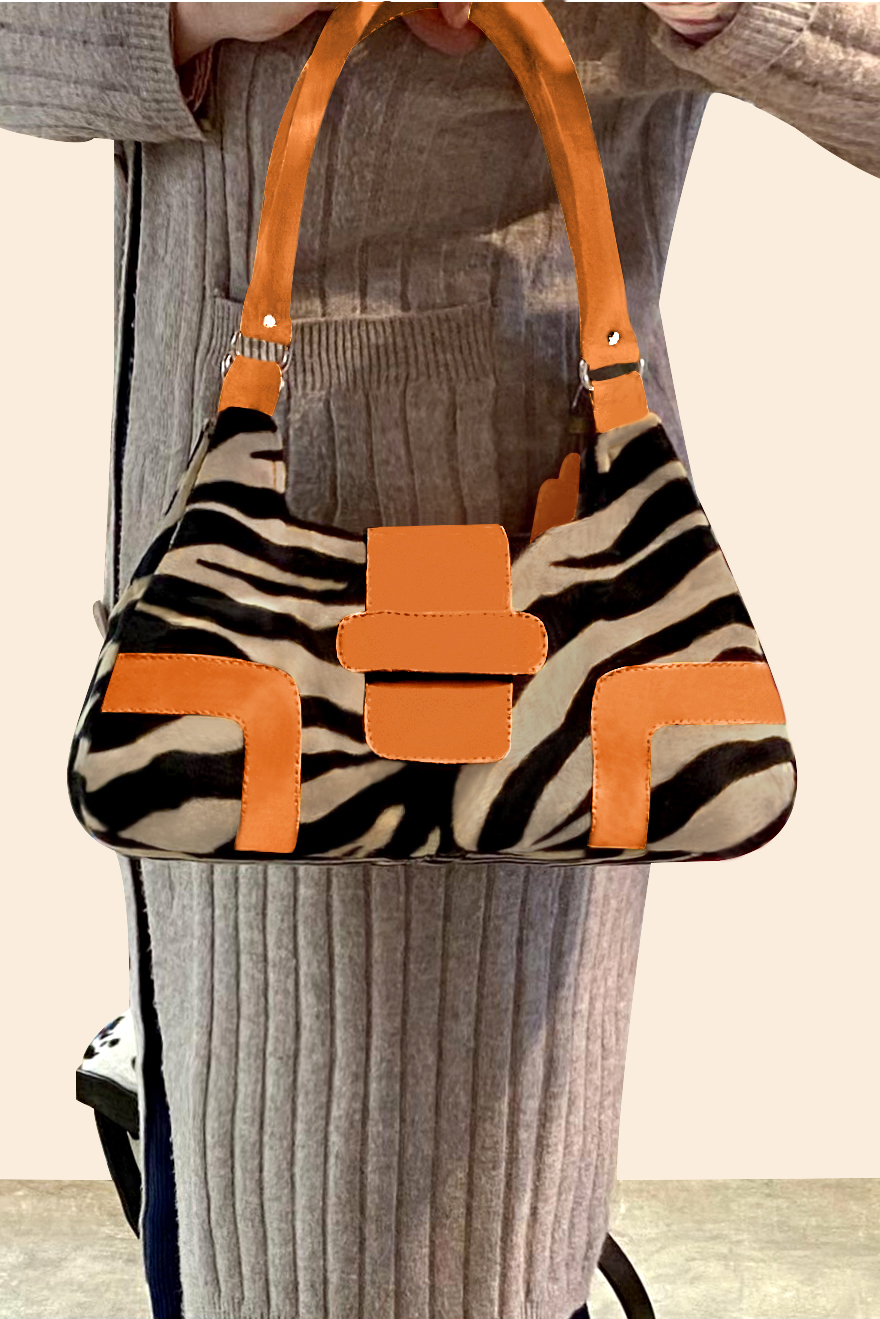 Safari black and apricot orange women's dress handbag, matching pumps and belts. Worn view - Florence KOOIJMAN